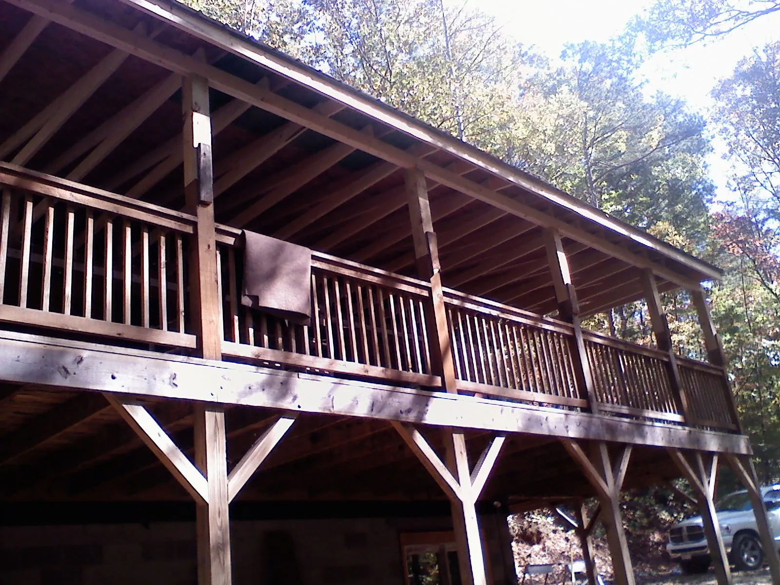 Timber framing under a new elevated porch and deck — Roof Leak Repair in Ottertail by Roofing Brothers